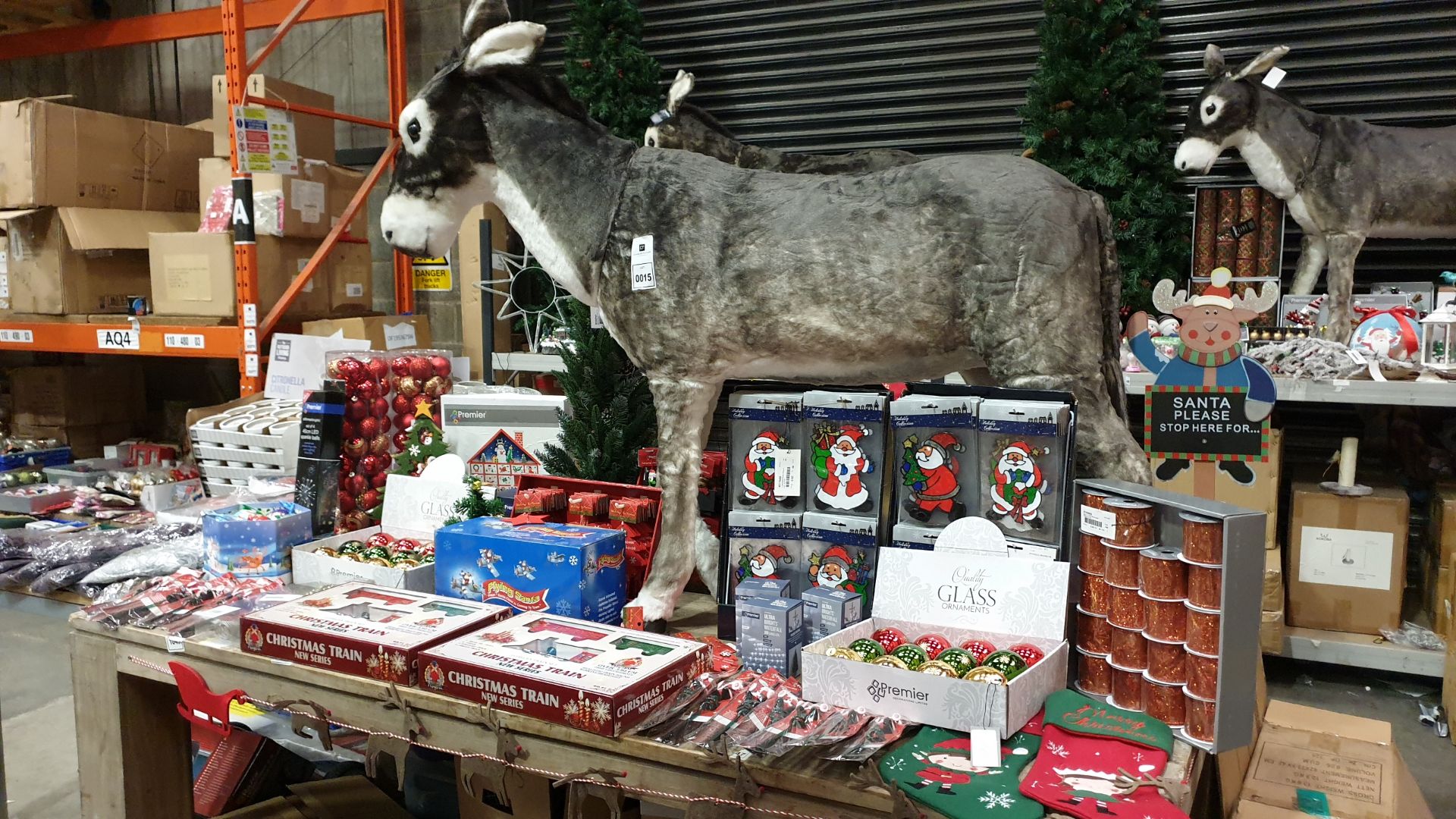 APPROX 120+ PIECE MIXED PREMIER CHRISTMAS LOT IE. LARGE CHRISTMAS DONKEY, SANTA WINDOW CLINGS,