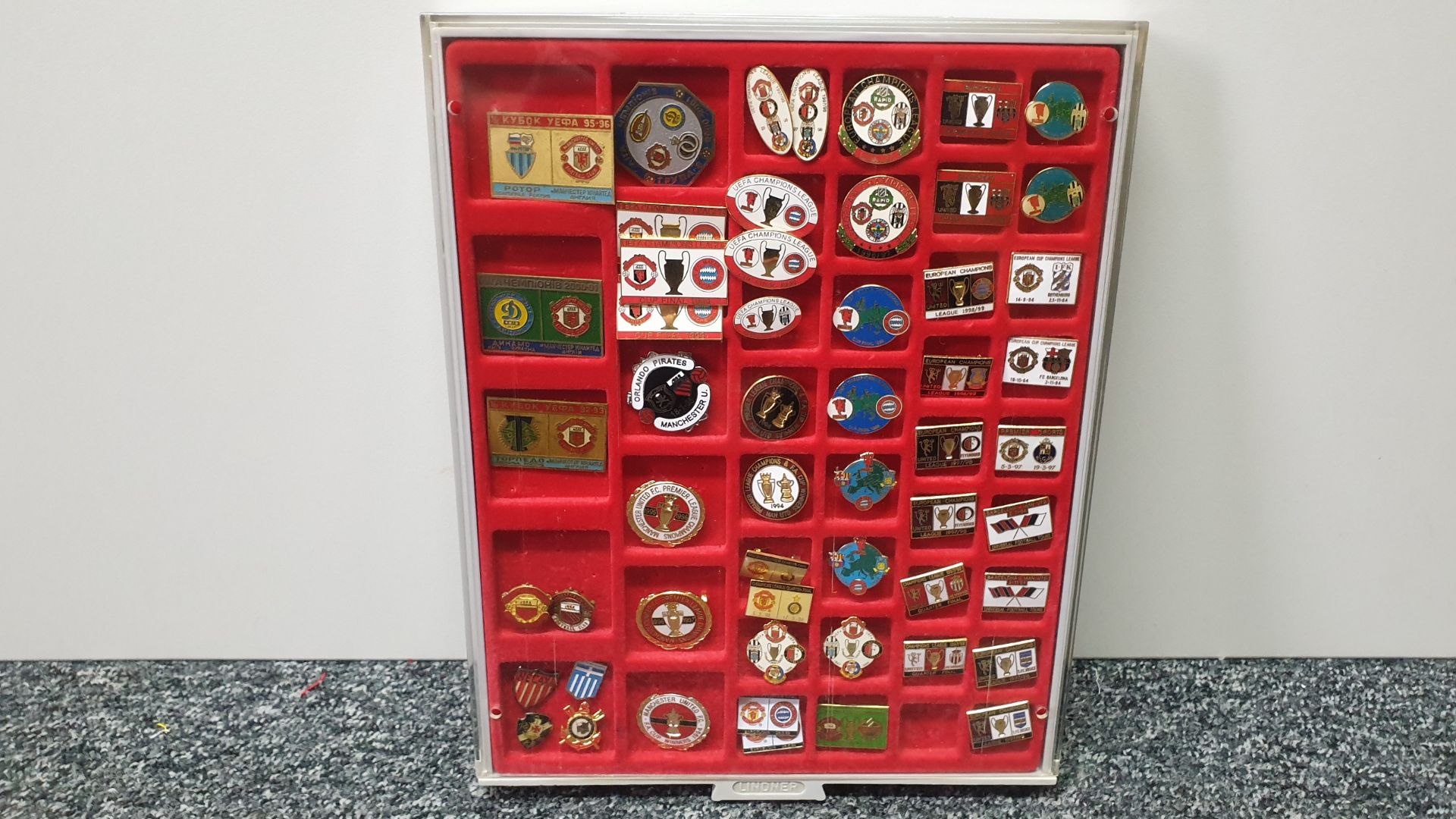 DISPLAY BOX CONTAINING 54 X MANCHESTER UNITED PINBADGES IE PREMIER LEAGUE CHAMPIONS AND FA CUP