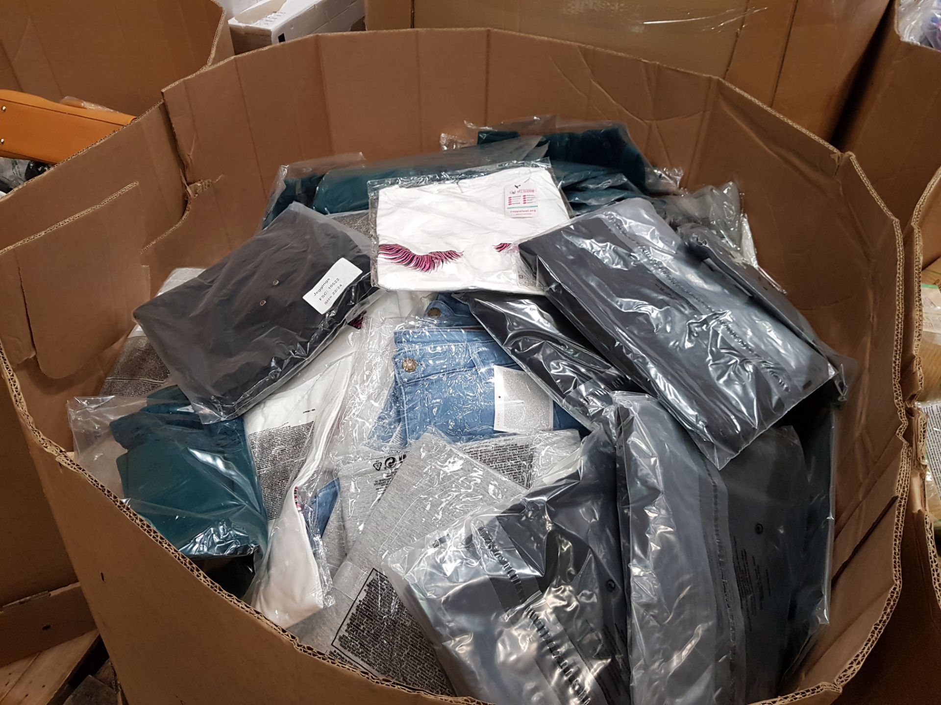 FULL PALLET OF AVON T-SHIRTS, TOPS, DRESSES AND JEANS