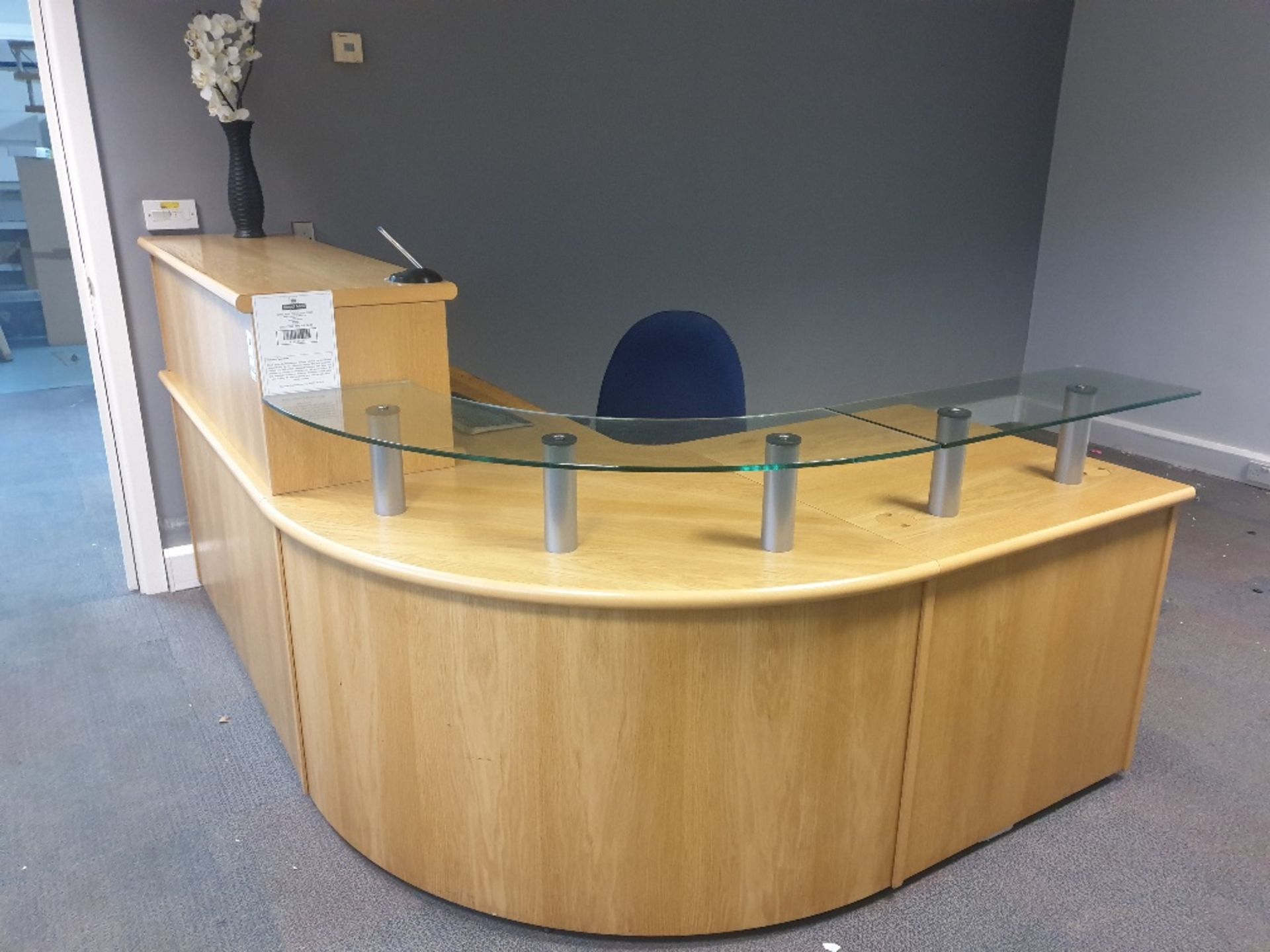 CURVED WOODEN RECEPTION DESK WITH GLASS SHELF AND 3 X 2 DRAWER PEDASTALS, DARK BLUE OFFICE CHAIR,