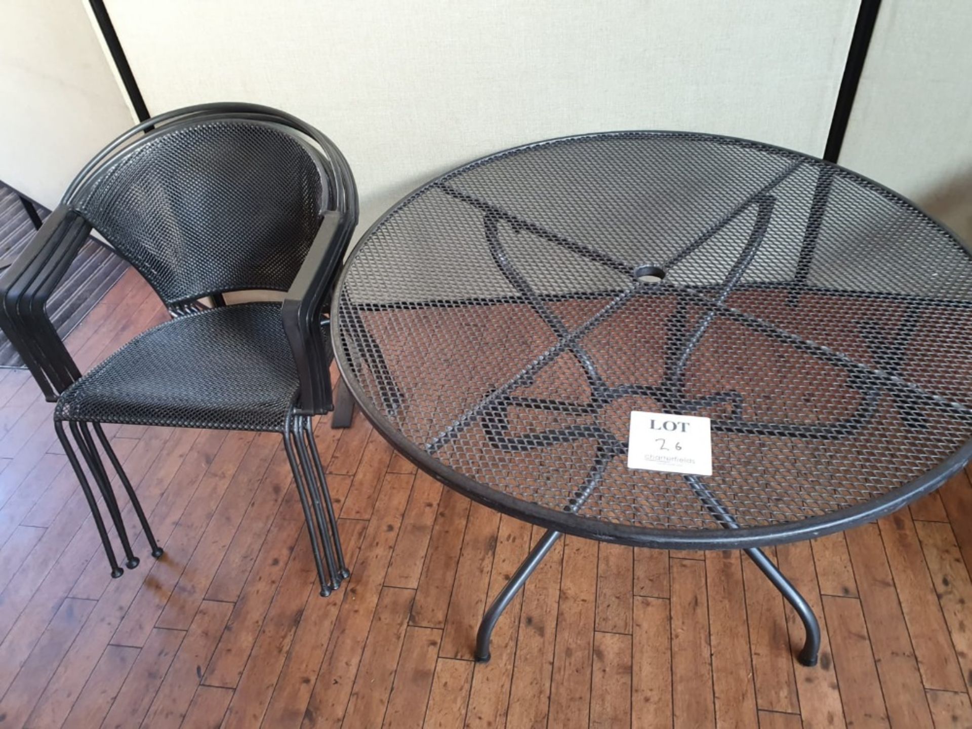 Circular metal table 1,050mm diameter with 4 metal chairs