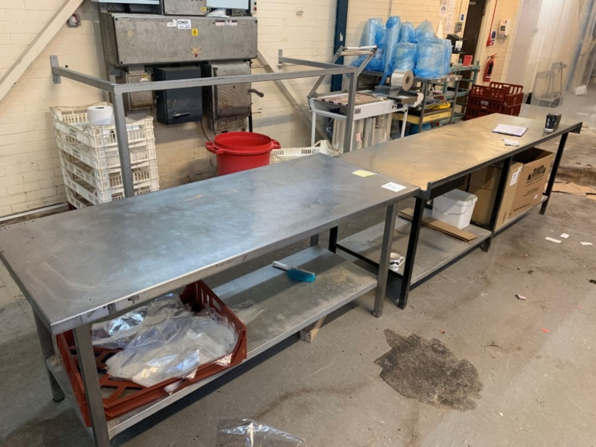 Stainless steel bench (750mm x 1,850mm) and stainless steel topped table (750mm x 2,450mm)