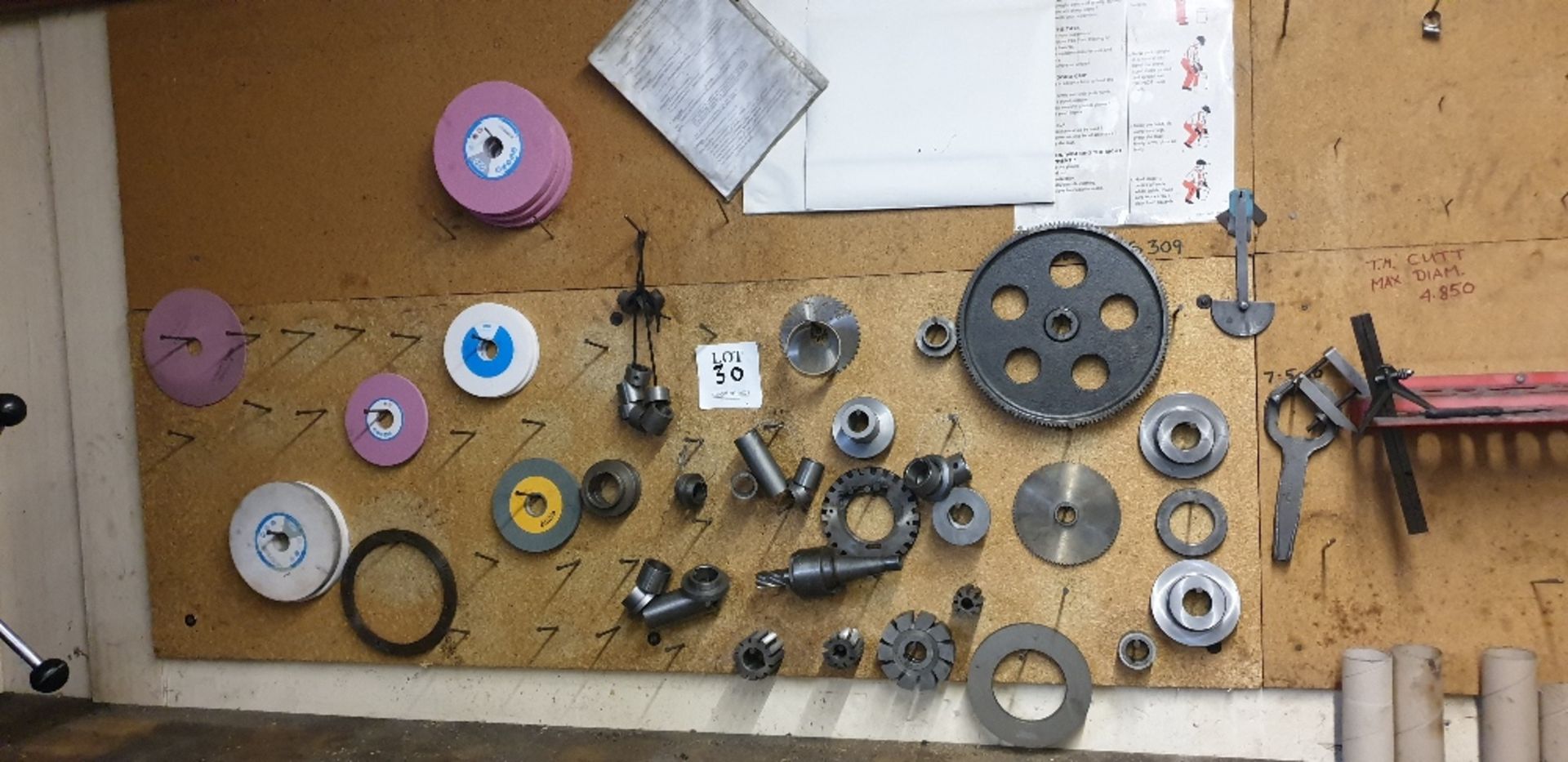 Wall board of various grinding wheels, cutters and spacers