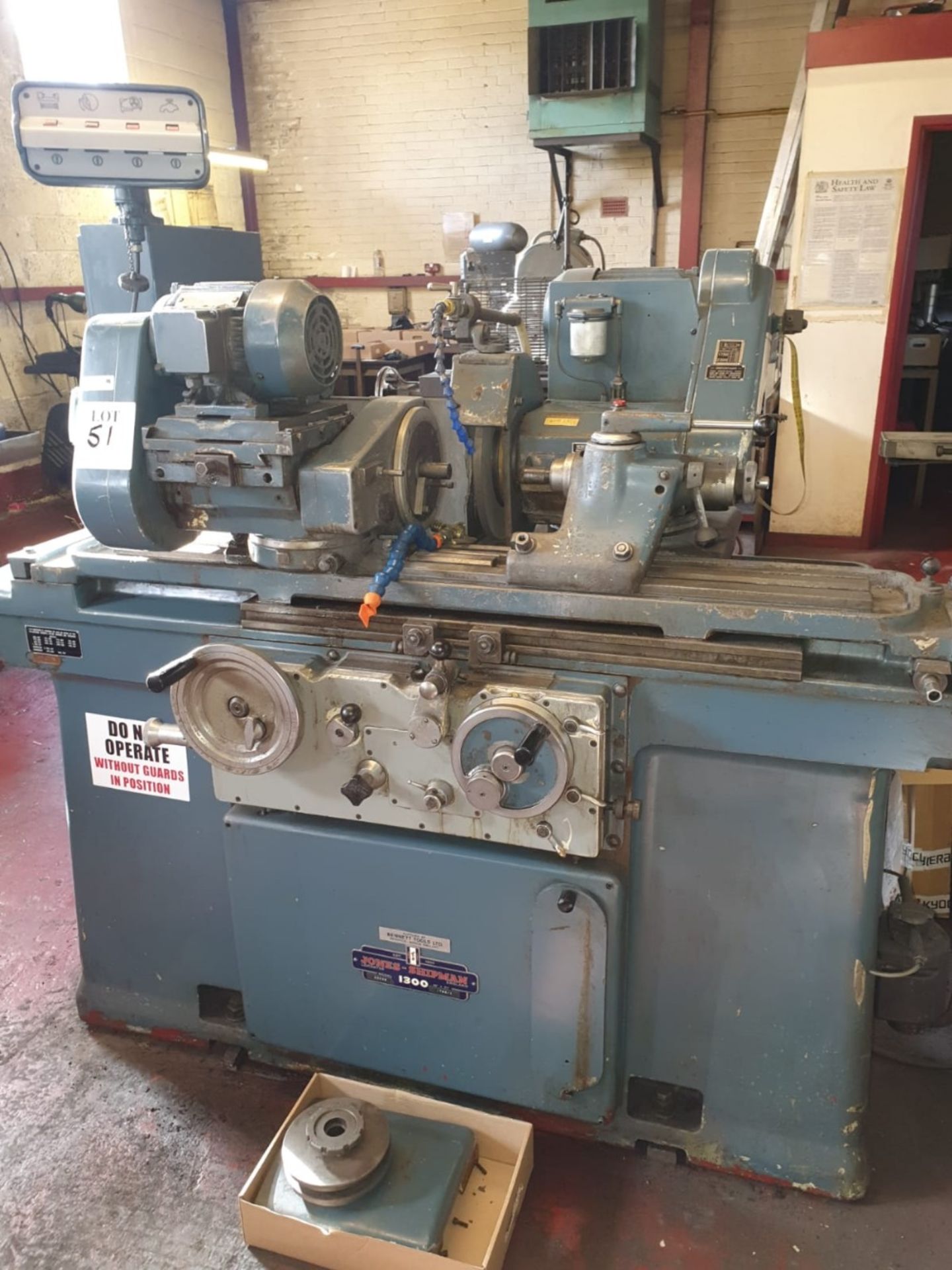 Jones and Shipman 1300 cylinderical grinder, capacity 10" x 27" with spare grinding wheels. Serial