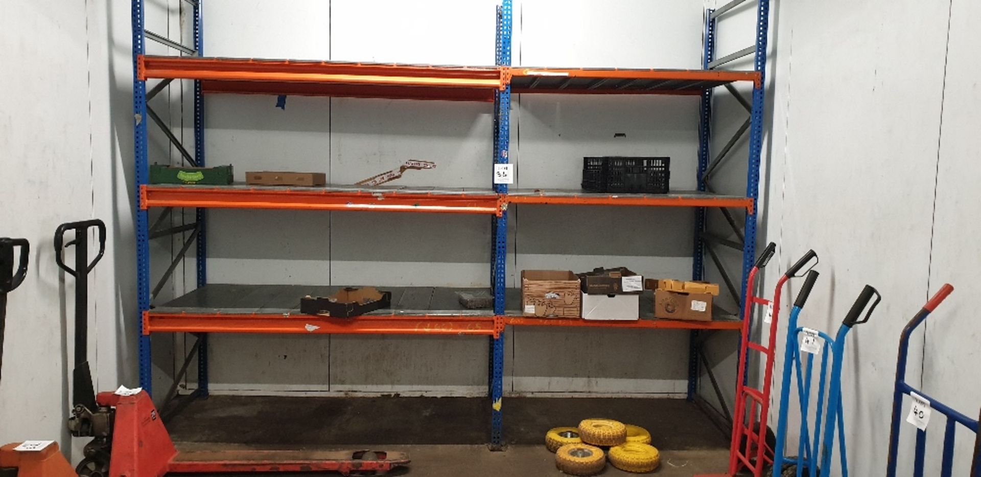 2 - Bays of pallet racking with metal shelf panels