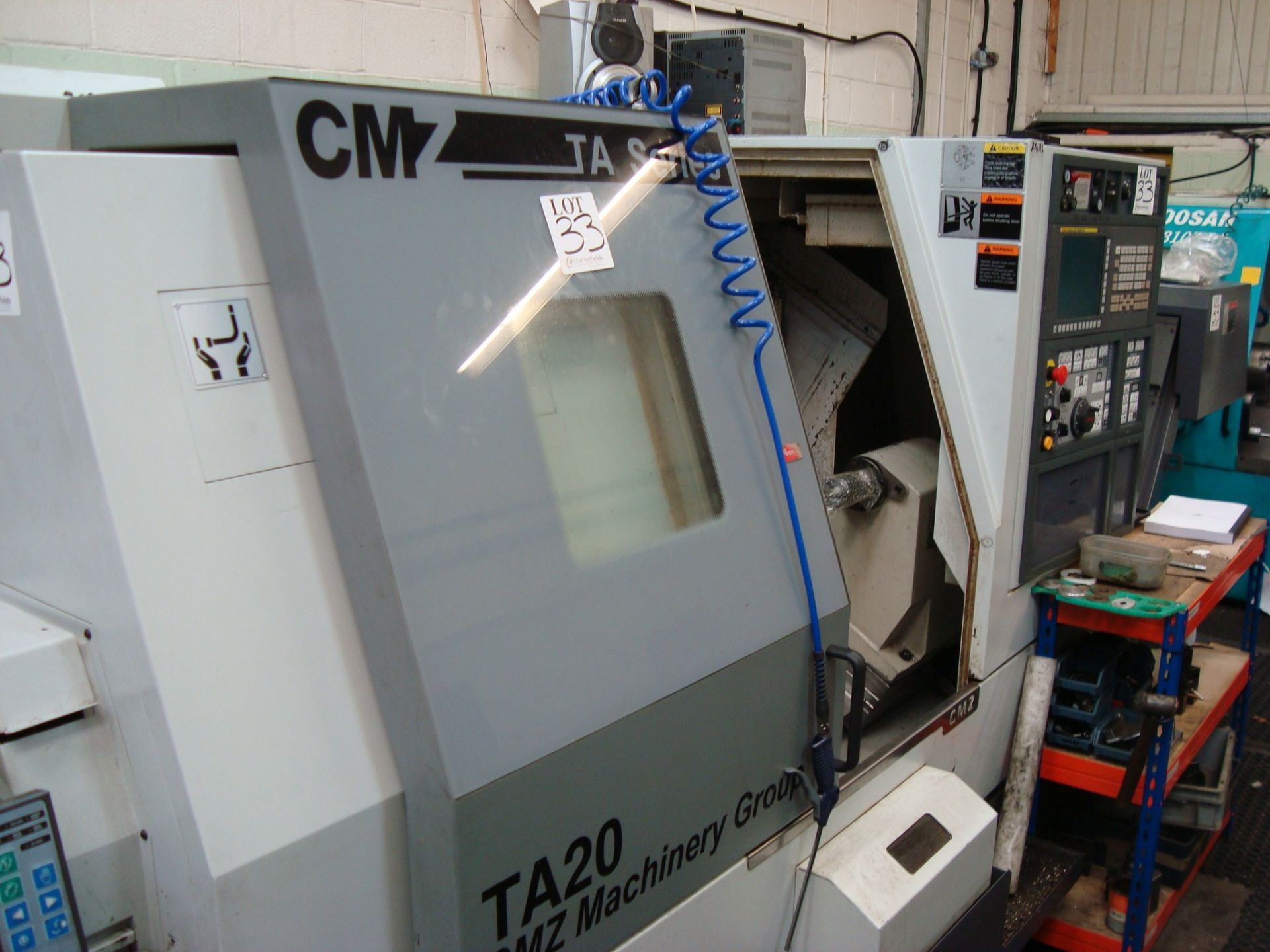 A CMZ TA-20-640 bar fed CNC turning centre Serial number 205 (2015) with Fanuc 32i-Model B control - Image 2 of 6