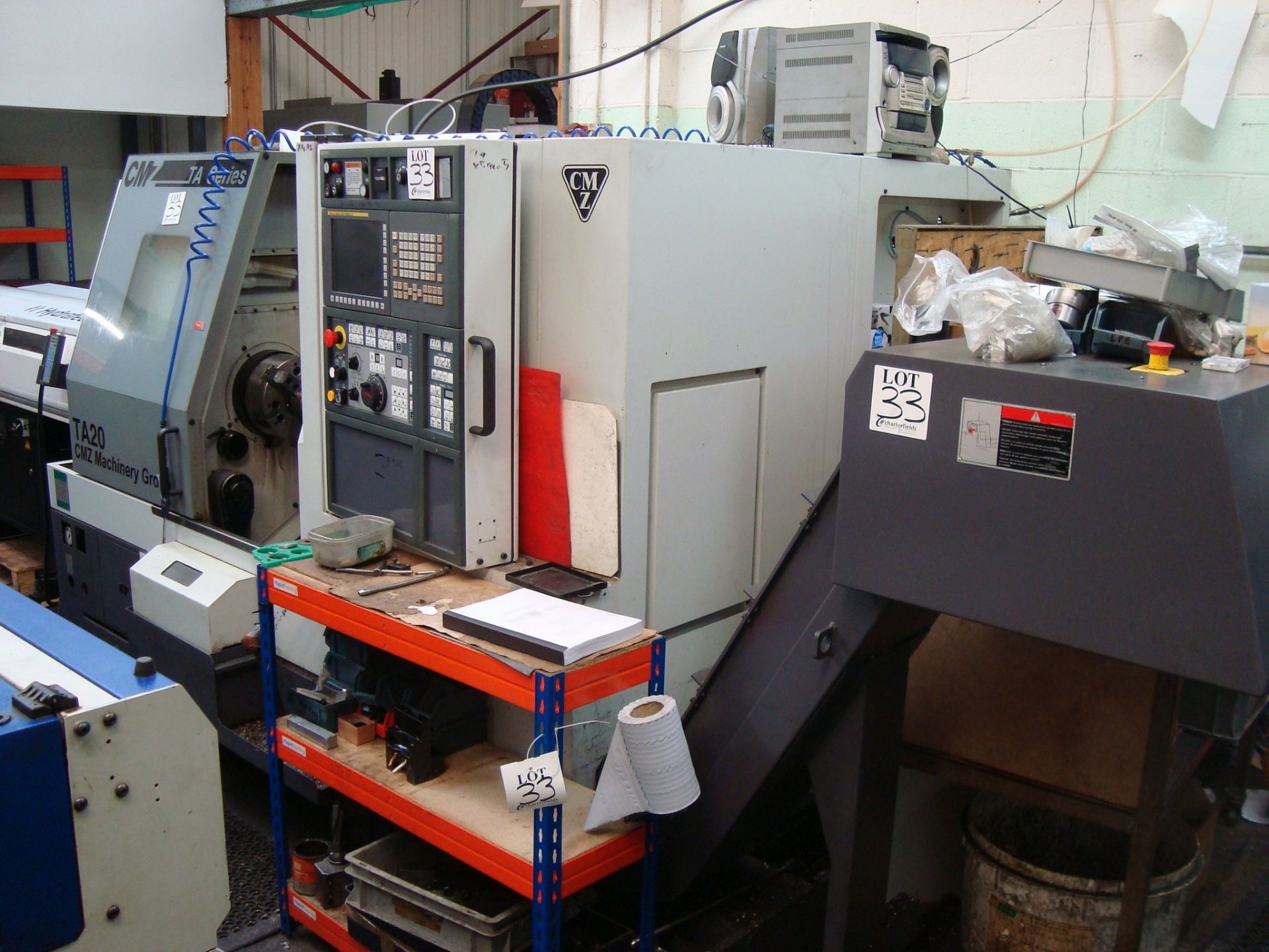 A CMZ TA-20-640 bar fed CNC turning centre Serial number 205 (2015) with Fanuc 32i-Model B control