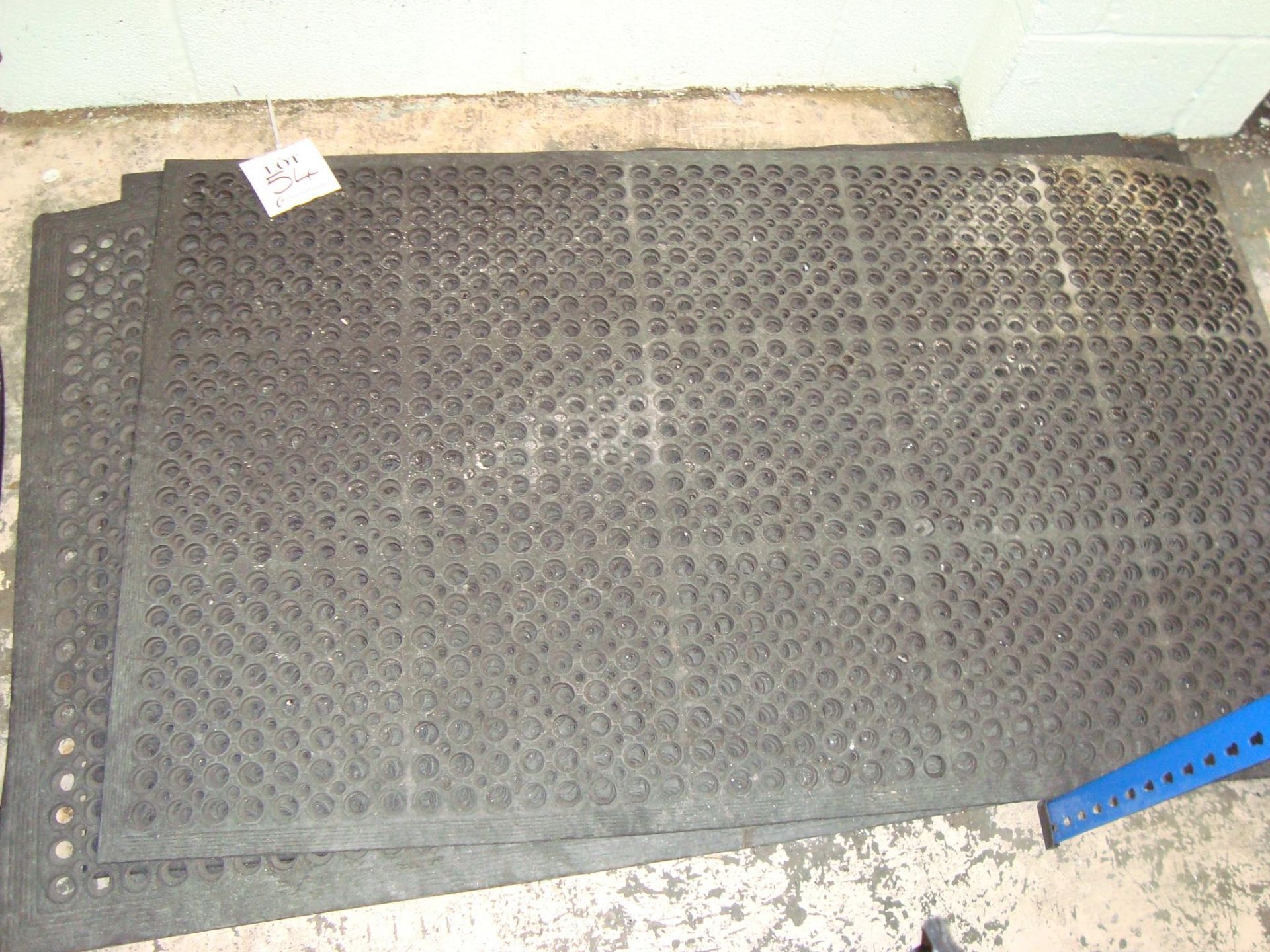 A quantity of non-slip perforated floor mats approx 1,500x800mm, as lotted