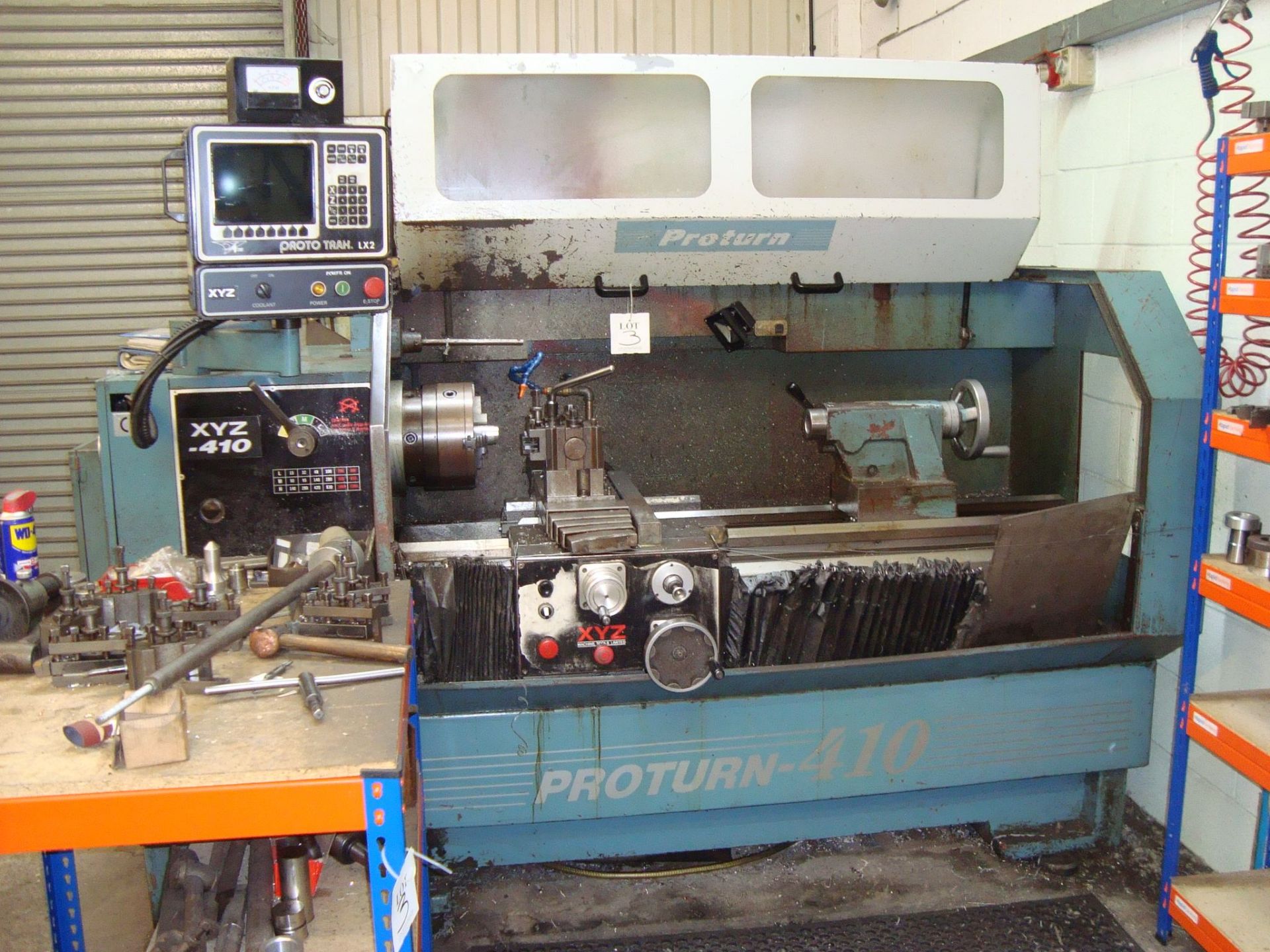 A Proturn 410 CNC gap bed lathe Serial number 122 with SWI ProtoTrak LX2 control system, chucks