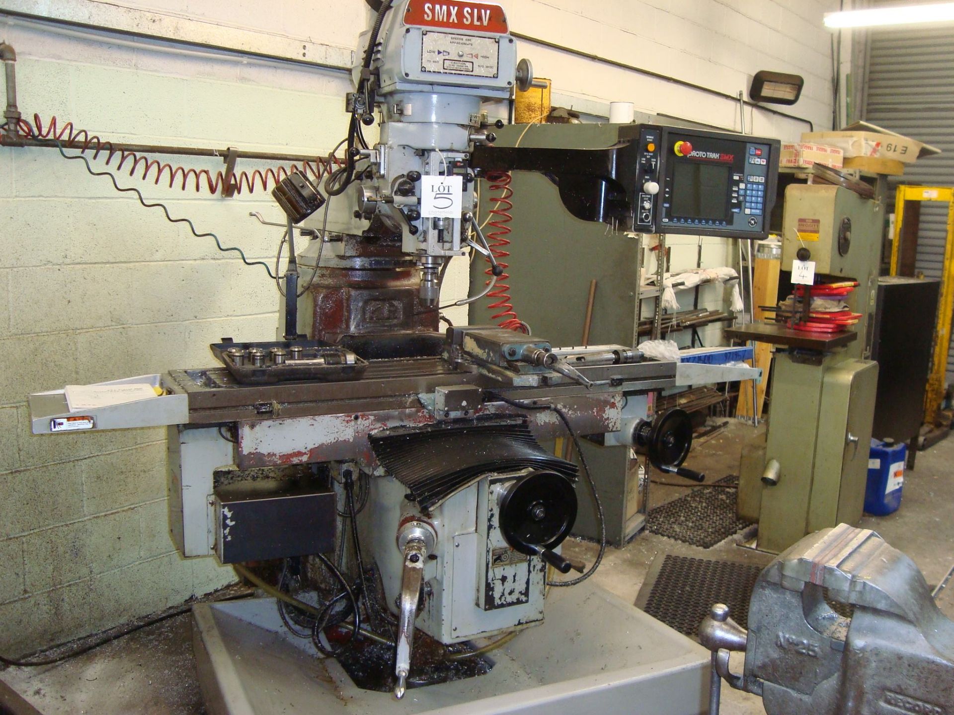 An XYZ SMX SLV vertical milling machine Serial number 10817 with ProtoTrak SMX control system,