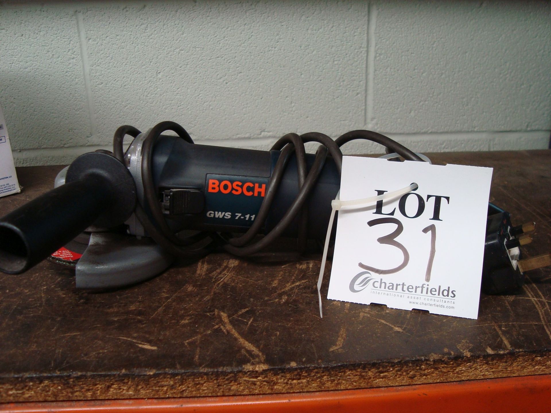 A Bosch GWS7-115 single phase angle grinder