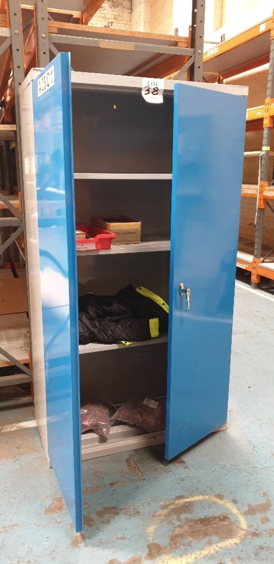 Steel double door cupboard and contents