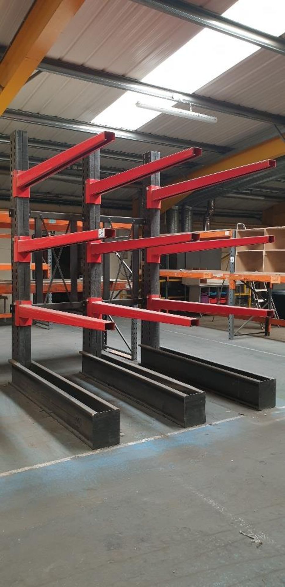 Heavy duty cantilever sheet rack comprising of three cantilever frames and 9 beams