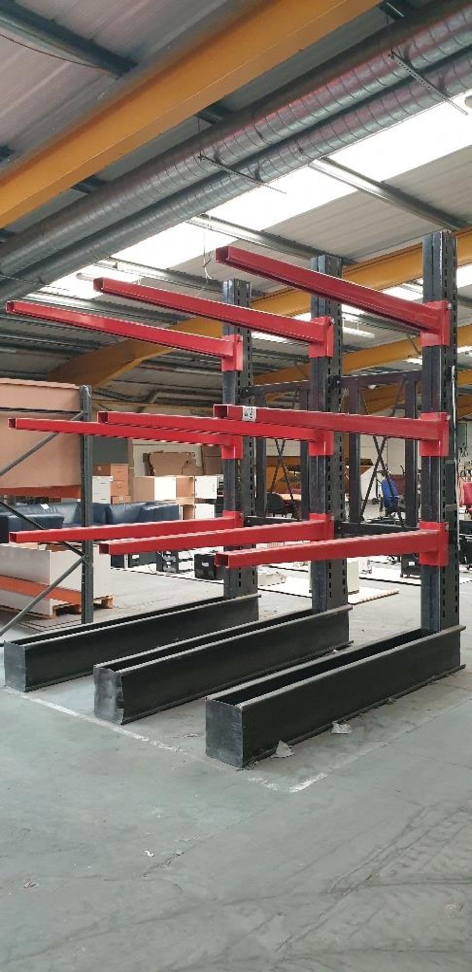 Heavy duty cantilever sheet rack comprising of three cantilever frames and 9 beams