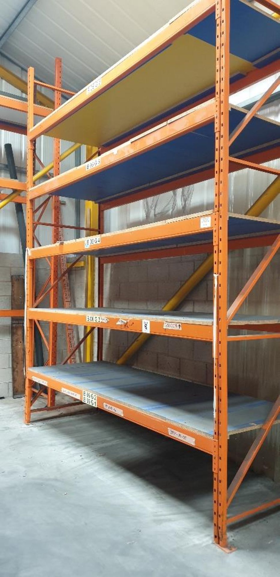 Single bay of 5 tier heavy duty pallet racking with 25mm chipboard shelving