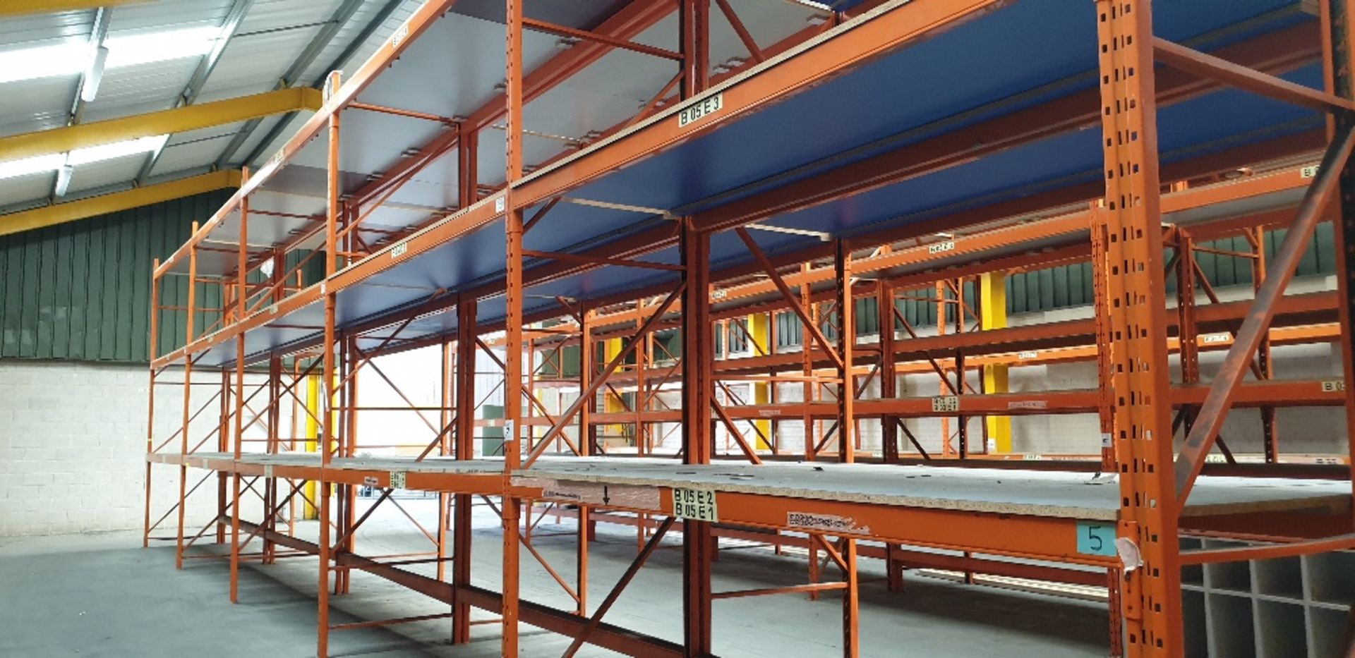 5 - bays of heavy duty pallet racking with 25mm chipboard shelving