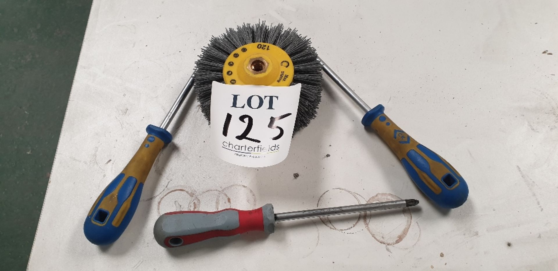 Abrasive wheel and 3 long series Phillips screwdrivers