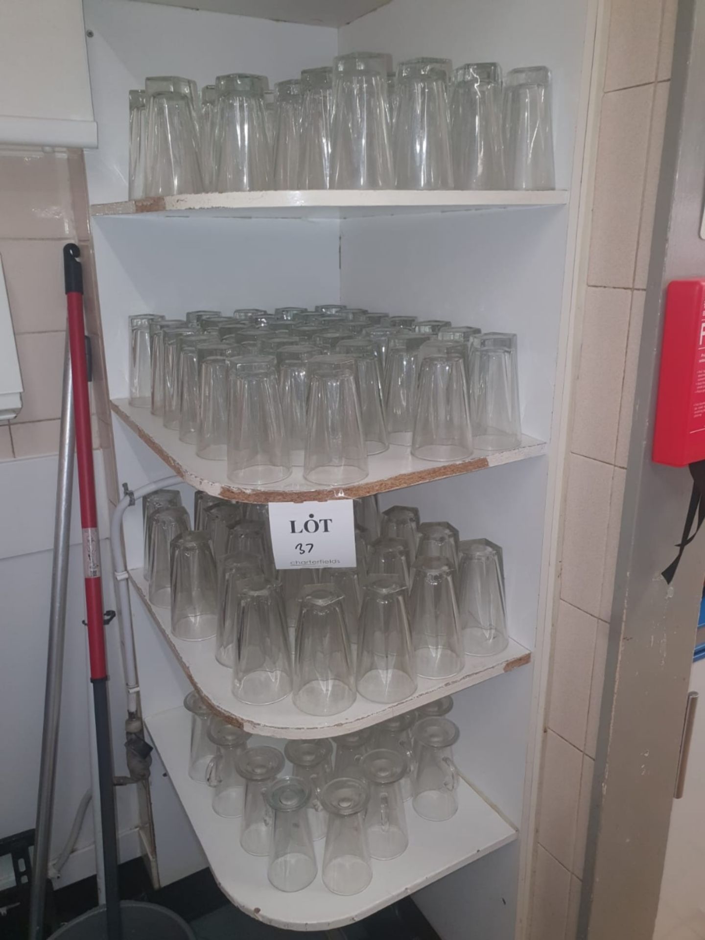 4 shelves of glassware