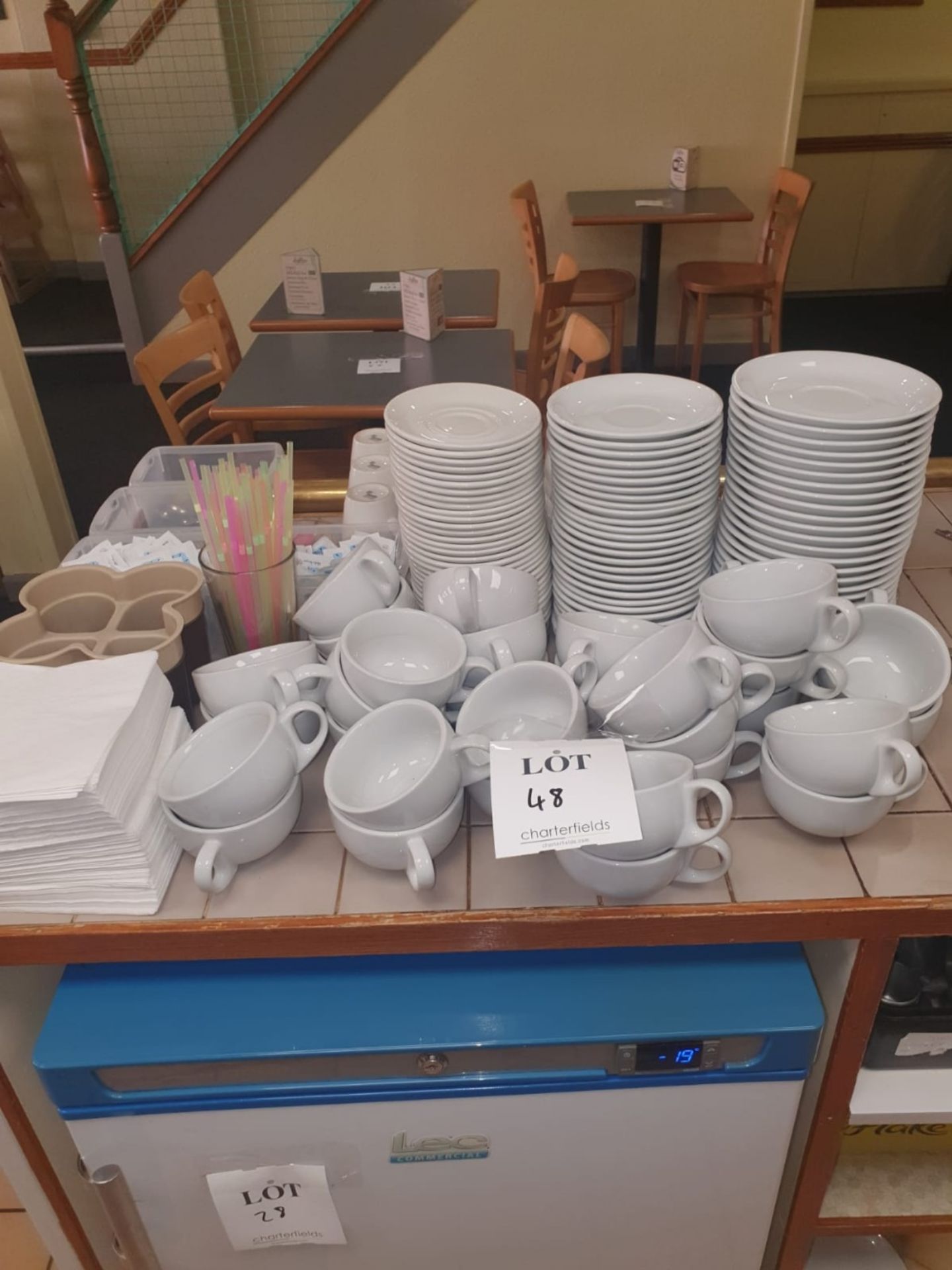 Large quantity of cups and saucers