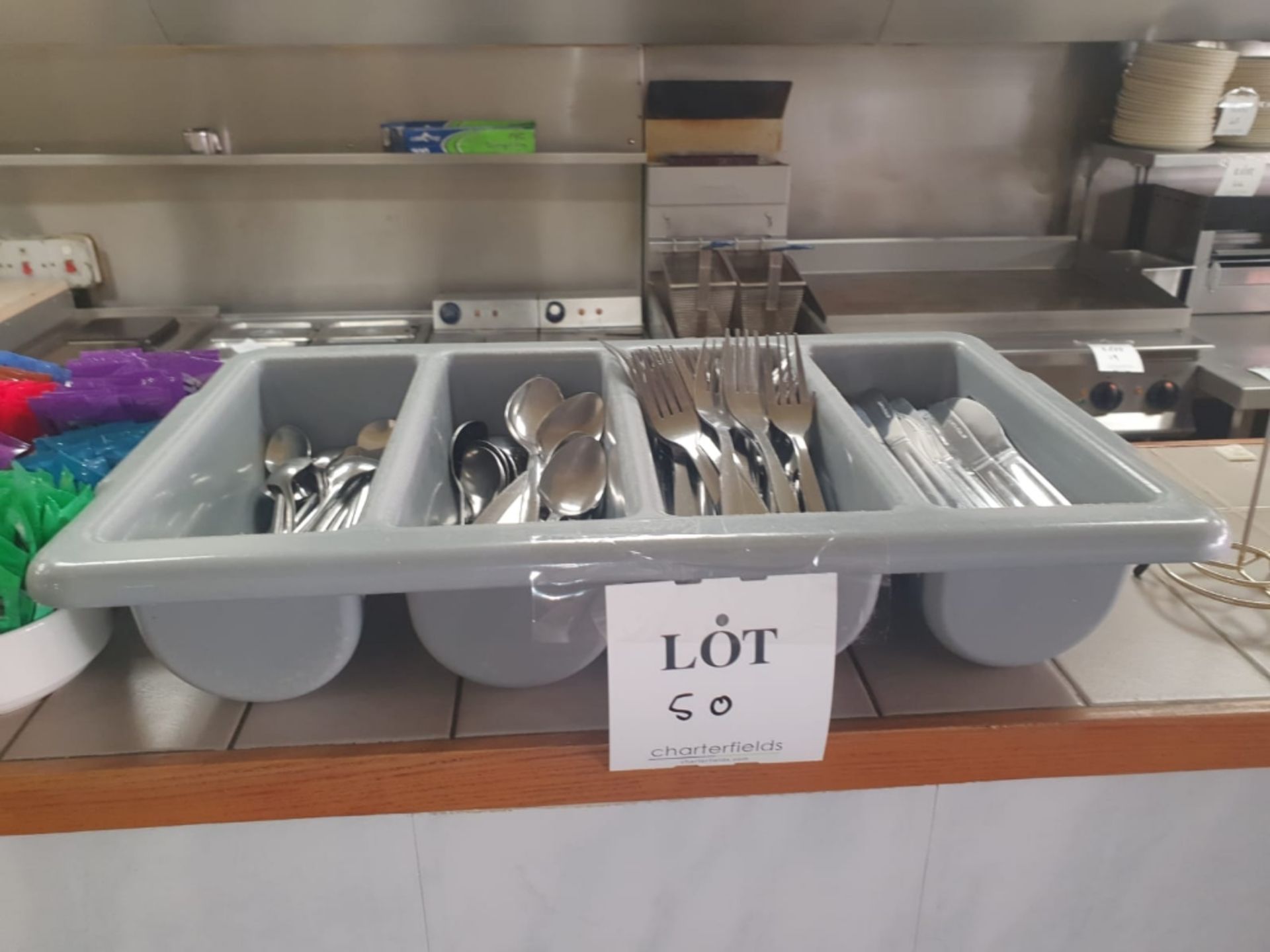 Cutlery tray with large quantity of cutlery