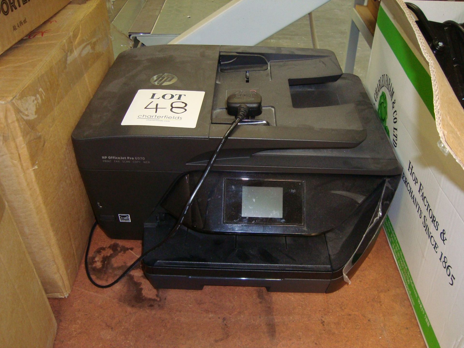 The office electronic equipment including Xerox Versalink C405 multi-function printer, Brewman