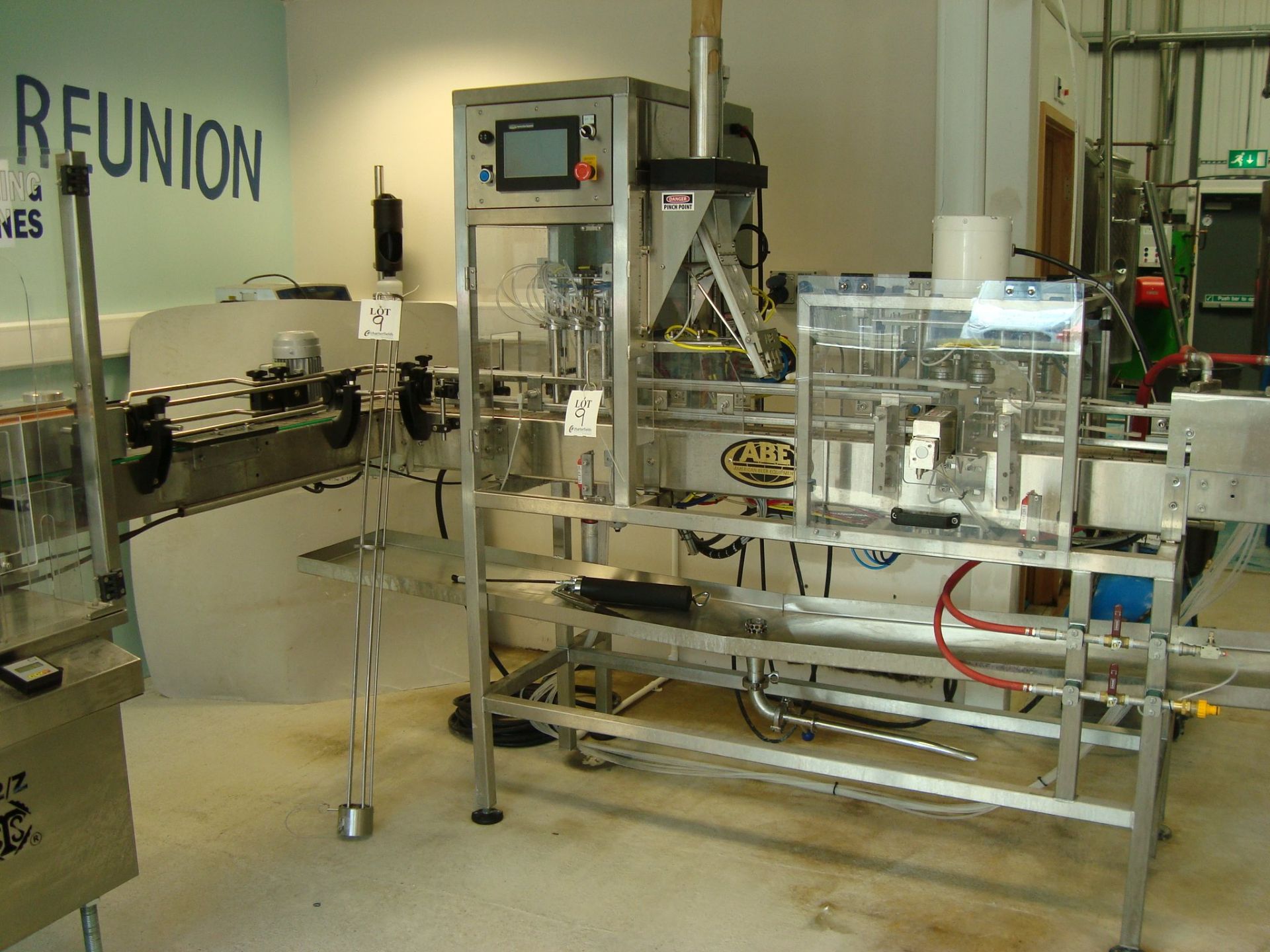 An American Beer Equipment CraftCan 15 through feed automatic canning line (2020) with:Twin Nozzle
