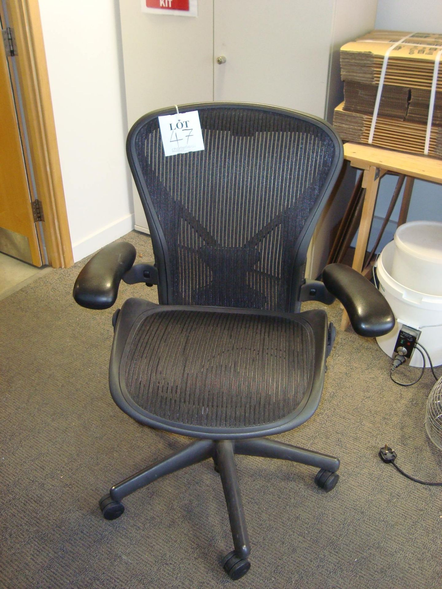 A Herman Miller Aeron swivel office elbow chair