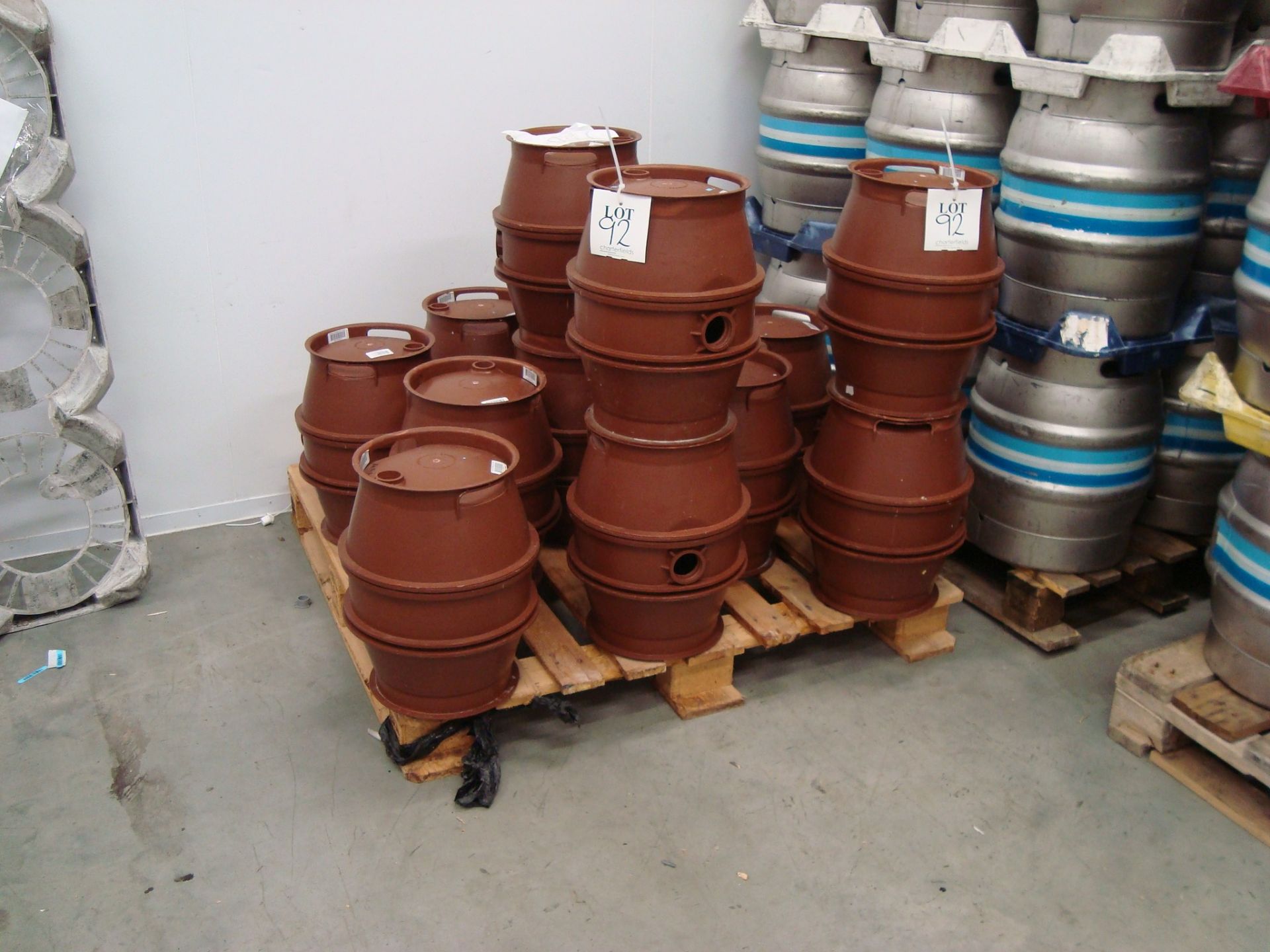 Twenty six plastic 4.5 gallon pin casks