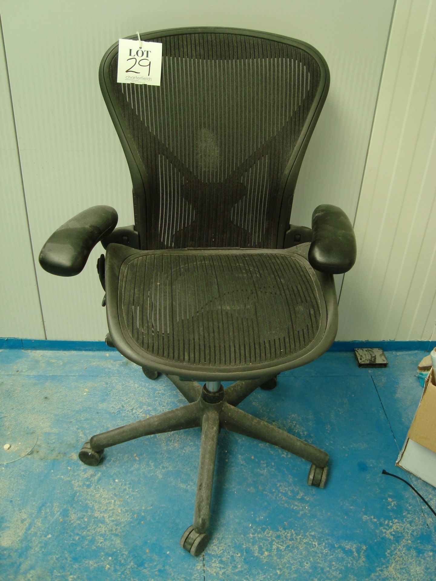 A Herman Miller Aeron swivel office elbow chair