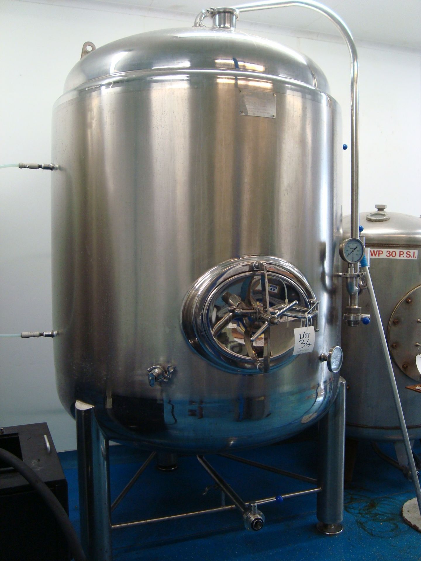 A Kunbo 2,250 litre stainless steel dish bottomed dual purpose vessel. Serial number KB-