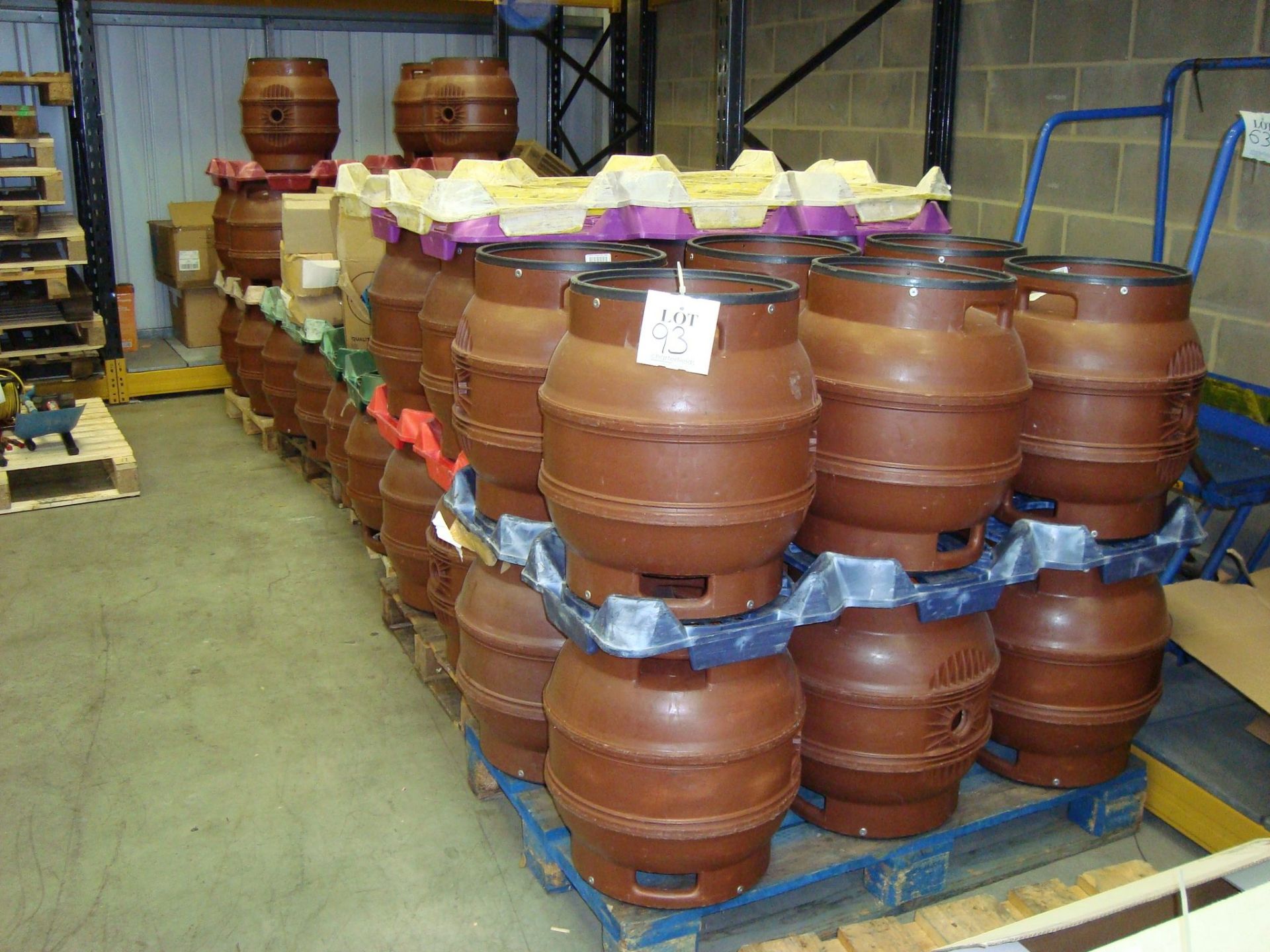 Fifty one plastic nine gallon firkin casks