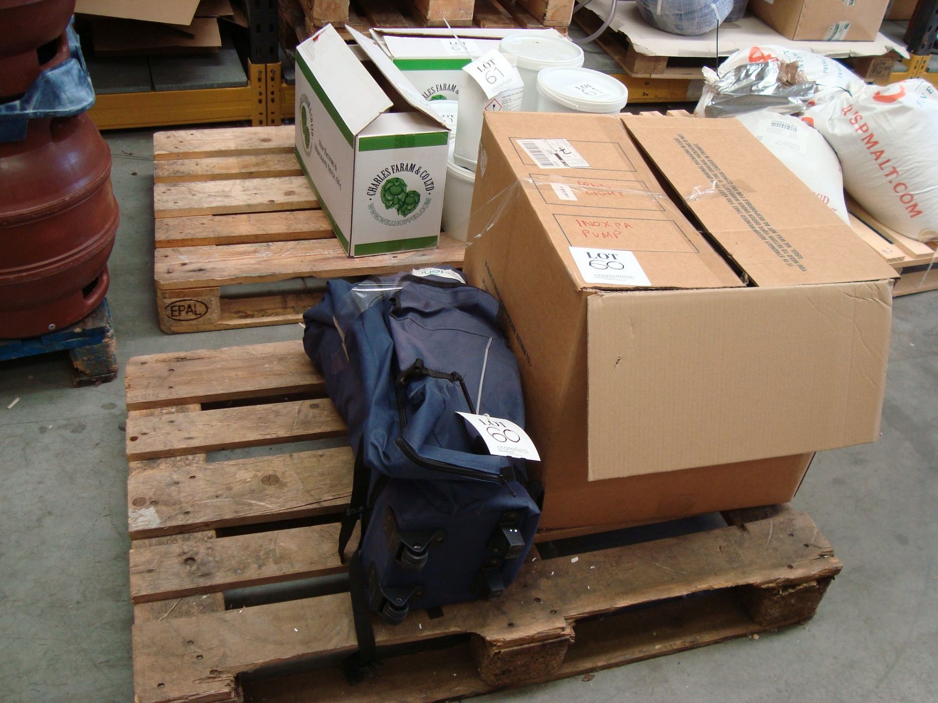 A mixed pallet of pumps and a downlight, all faults, for spares