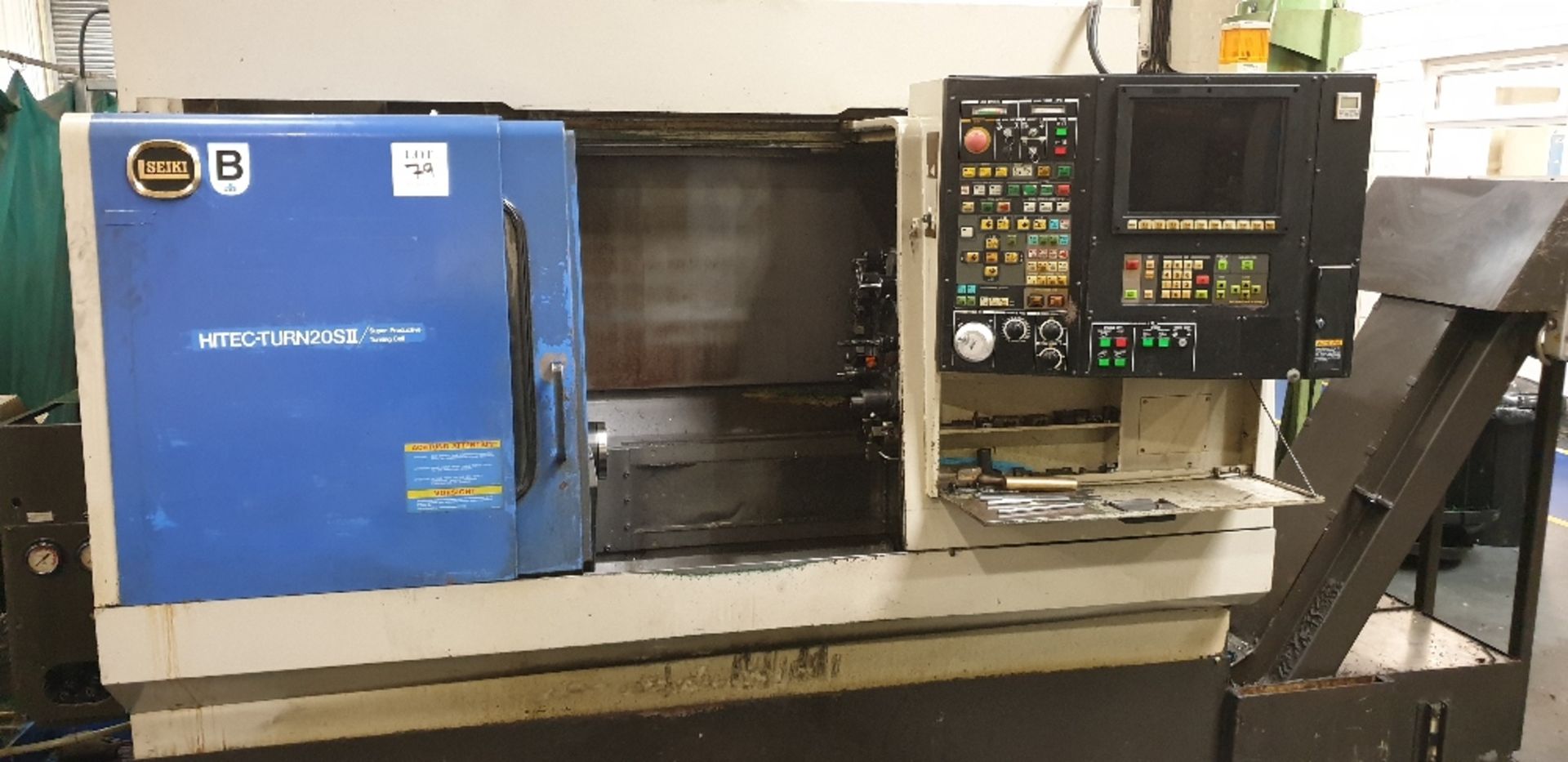 Seiki Hitec-Turn 20 SII CNC lathe. Serial No. HTS24105 YOM 2005 with Swarf conveyor and associated