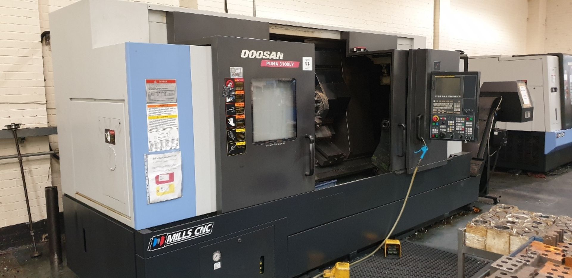 Doosan Puma 3100LY CNC lathe. Serial No. ML0118-000135. YOM 2014 with 12 position tool holder and