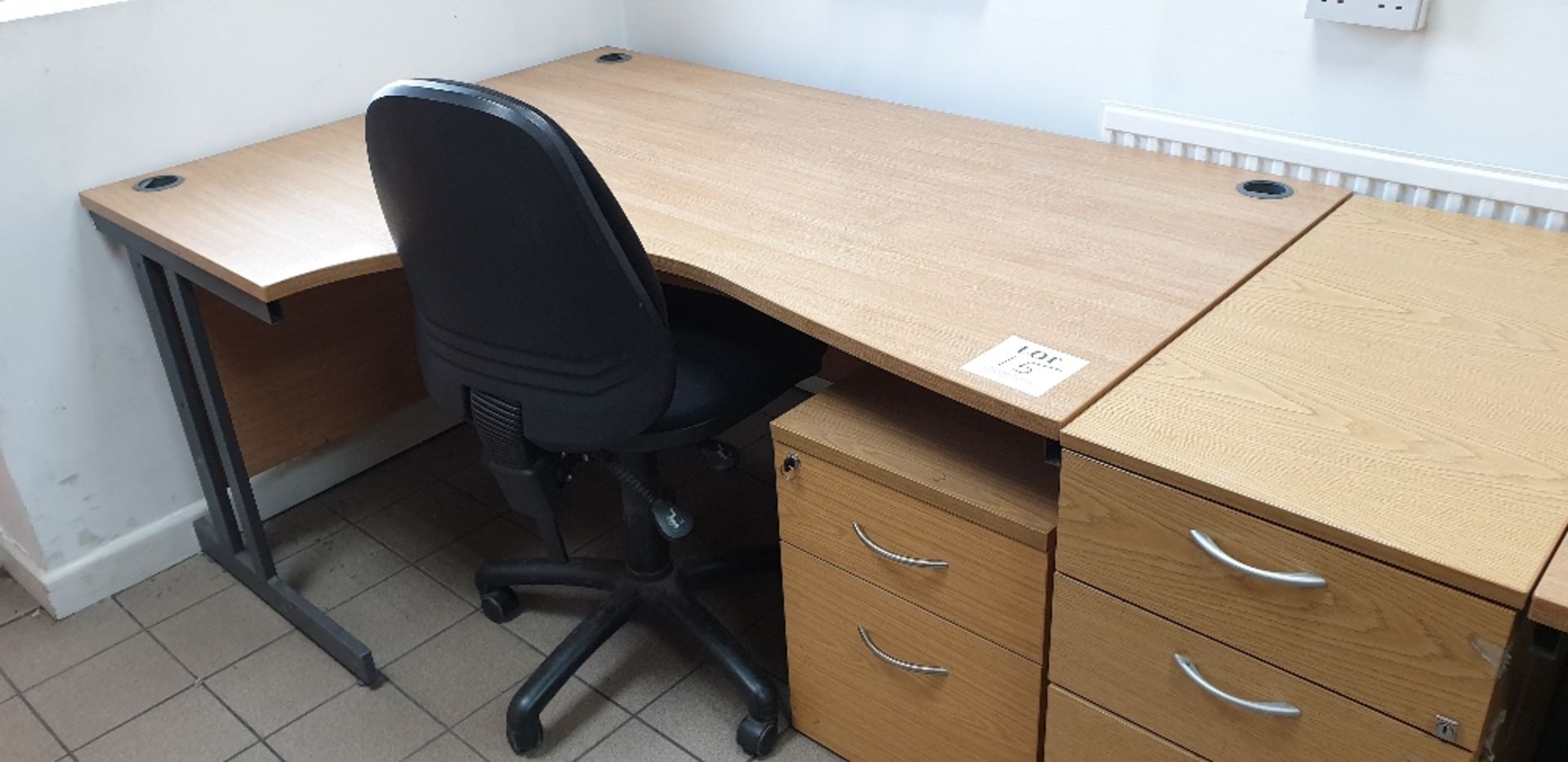 Curved desk with swivel chair and two drawer desk pedestal