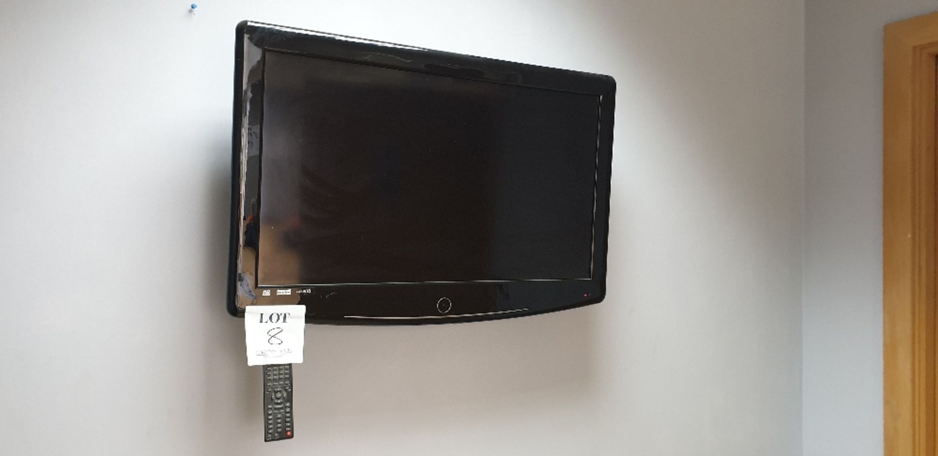 Digimax wall mounted television and remote control