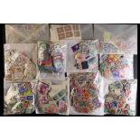 COLLECTIONS & ACCUMULATIONS OFF-PAPER STAMPS SORTED BY COUNTRY including packets of France,