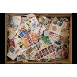COLLECTIONS & ACCUMULATIONS OFF PAPER WORLD ACCUMULATION in a box, around 7000 stamps