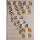 GB.ELIZABETH II 1994-1999 COMMEMORATIVE SETS IN BLOCKS AND PAIRS housed in a red stockbook. Mainly