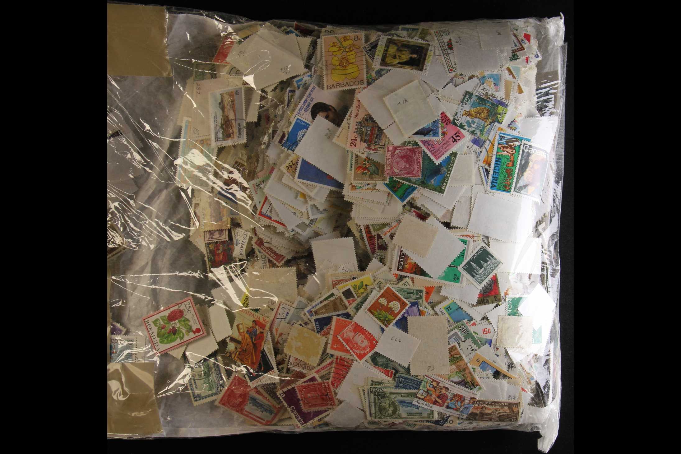 COLLECTIONS & ACCUMULATIONS OFF PAPER COMMONWEALTH unsorted mass of stamps, Br Europe, America,