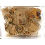 COLLECTIONS & ACCUMULATIONS 1000s OF STAMPS! A large box filled with on & off paper stamps. Much