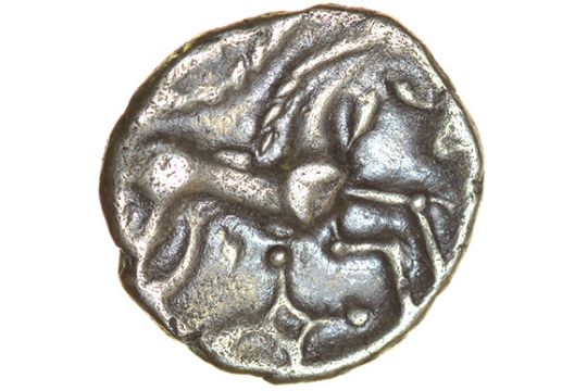 Norfolk God. Moustache Type. Talbot dies XB/84. c.AD 25-43. Celtic silver unit. 12mm. 1.10g. - Image 2 of 2