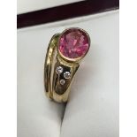 FINE PINK TOPAZ & DIAMOND RING MARKED 750 9.2 GRAMS