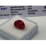 RED STONE WITH CARD MARKED RUBY