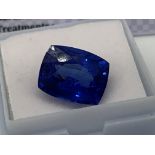 BLUE STONE WITH CARD MARKED SAPPHIRE