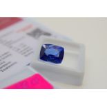 BLUE STONE WITH CARD MARKED BLUE NATURAL SAPPHIRE