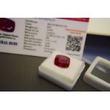 RED STONE WITH CARD MARKED RED NATURAL RUBY