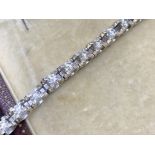 18 carat white gold tension Set diamond bracelet approximately 3.00cts of G colour VS diamonds