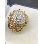 18 carat gold ring set with single stone diamond and cluster of diamonds weight approx 1.30 cts