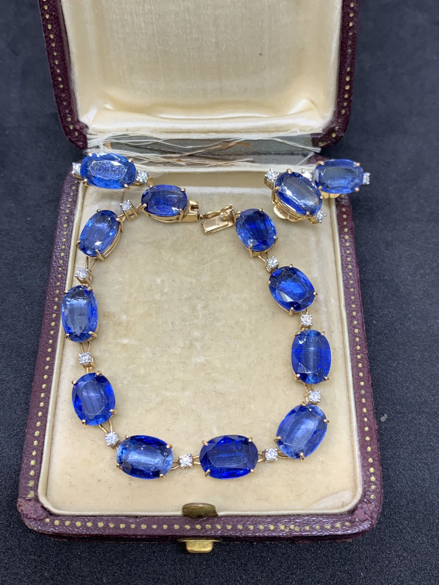 10 carat gold bracelet ring and earring set with blue stones and diamonds